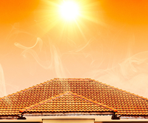 hot summer sun blazing on roof of residential home