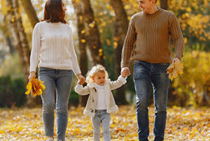 Family walking in the fall outdoors