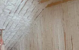 Spray foam insulation applied to attic rafters and knee wall. Spray foam insulation applied to attic rafters and knee wall in a Nashville residential new construction home by Hayes Insulation.