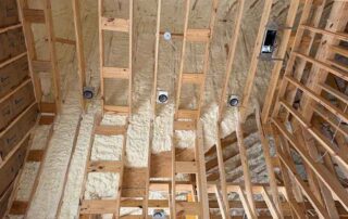 Spray foam insulation partially applied to curved attic ceiling Spray foam insulation partially applied to curved attic ceiling.